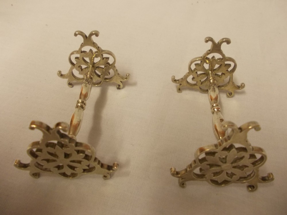 pair of silver knife stands