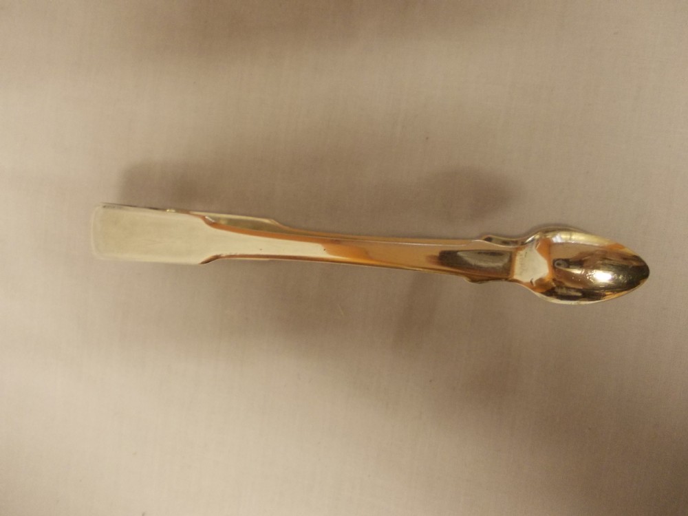 pair of silver sugar tongs