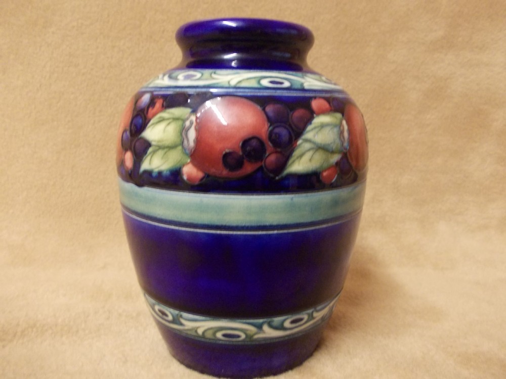 a moorcroft banded pomegranate vase